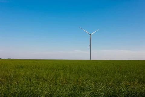 Panoramic view of wind farm or wind park, with high wind turbines for generat Stock Photos