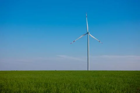 Panoramic view of wind farm or wind park, with high wind turbines for generat Stock Photos