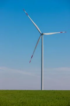 Panoramic view of wind farm or wind park, with high wind turbines for generat Stock Photos