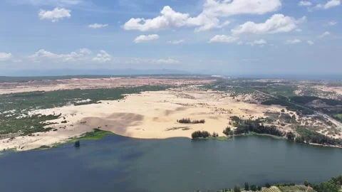 Panoramic view of wind turbines desert and lake at Phan Thiet Stock Footage 315328171