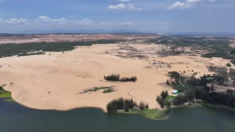 Panoramic view of wind turbines desert and lake at Phan Thiet Stock Footage 315328301