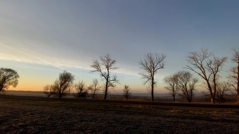 Panoramic view of winter sunrise in field without snow. Stock Footage 123013673