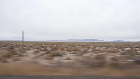 Panoramic views of a desert with high voltage towers Stock Footage 223360600