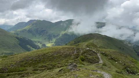 Panoramic Vista of Lush Green Mountains and Dramatic Clouds in the Summer A.. Stock Footage 326052084