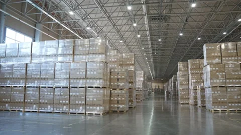 Panoramic viwe of bir logistic hub with boxes on shelves Stock Footage 210749937