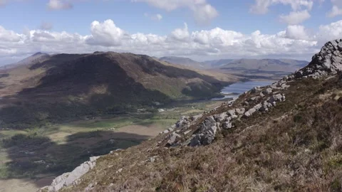 Panoramic Walking along dirt road in irish mountain in a cloudy day in summer Stock Footage 201845764
