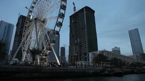 Panoramic wheel in dubai 2010 sunset Stock Footage 139099082