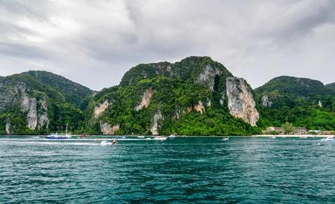 Panoramic wide-angle view of Ko Phi Phi island in Thailand from the sea, su.. Stock Photos