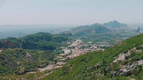 Panoramic Wide Angle View Of Lush Green Mountains Overlooking City Stock Footage 333611754