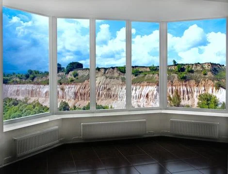 Panoramic window overlooking sandy cliff. View of sand pit from window of roo Stock Photos
