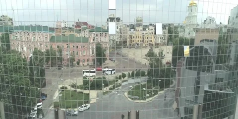 Panoramic windows office in high building which reflect city Stock Footage 260408956