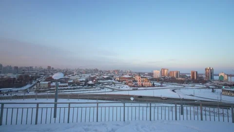 Panoramic winter cityscape viewed from a hill Stock Footage 328460224