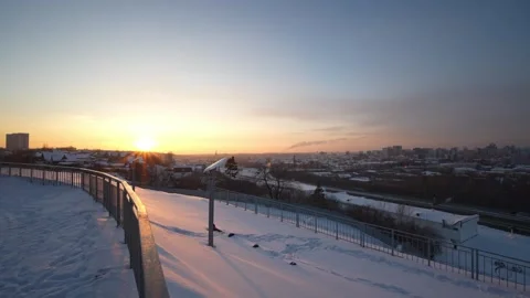 Panoramic winter cityscape viewed from a hill Stock Footage 328460226