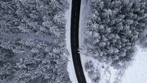 Panoramic winter drone view of the mountains in the forest. Asphalt road 스톡 동영상 231907425