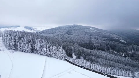 Panoramic winter drone view of the mountains in the forest. Stock-Footage 232411629