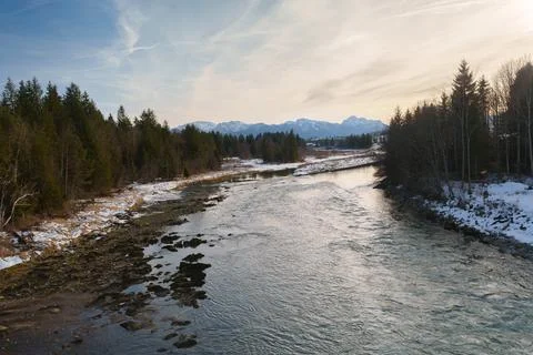 Panoramic winter view of the Lech river and Bavarian Alps at sunset Stock Photos