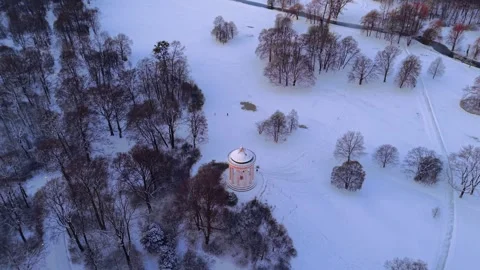 Panoramic winter view of Munich landmarks. Drone footage of the Englischer Stock Footage 326645612
