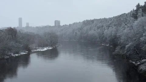 Panoramic winter view of snowy Neris river from bridge in Vilnius, LithuaniaI Stock Footage 260076924