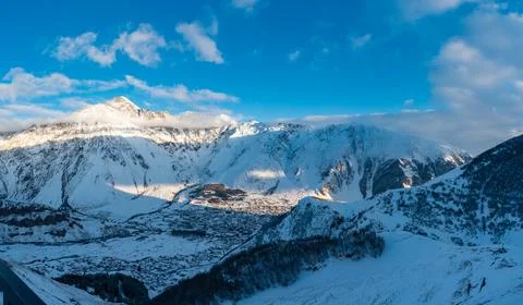 Panoramic Winter View of Stepantsminda and Caucasus Peaks, Georgia Stock Photos
