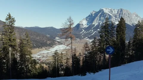 Panoramic winter view of Zugspitze mountain peak and alpine valley Stock Footage 333223377