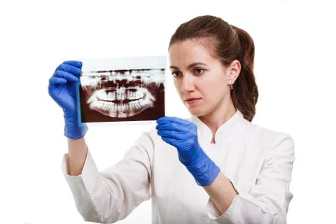Panoramic x-ray image of teeth in hands of dentist. The doctor - dentist wome Stock Photos