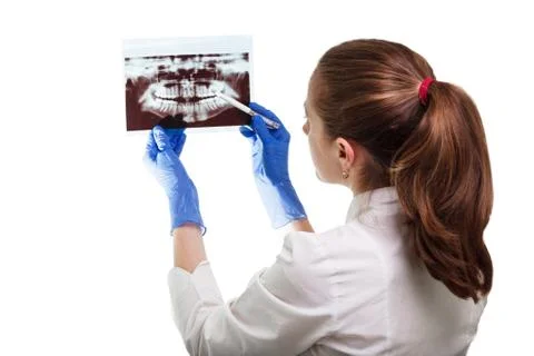 Panoramic x-ray image of teeth in hands of dentist. The doctor - dentist wome Stock Photos