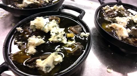 Pans full of escargots, with roquefort cheese Stock Footage 58302575