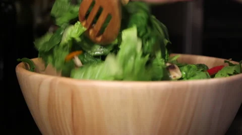 Pans of salad being tossed Stock Footage 61406133