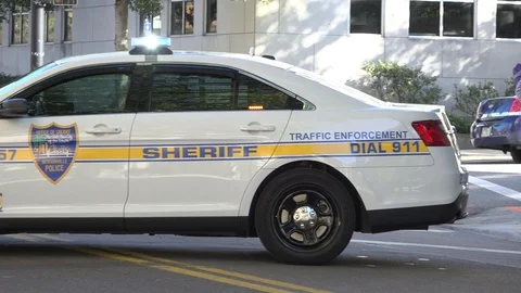 Pans of sheriff car 3 Stock Footage 128446703