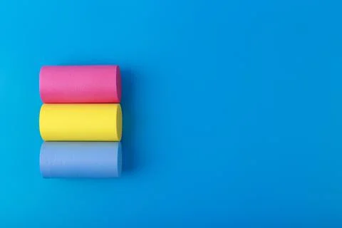 Pansexual flag on blue background with copy space Symbol of pansexual community Stock Photos