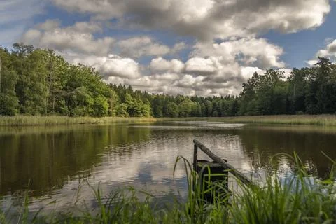 Pansky pond with white clouds in end of summer near Vysne village Stock Photos
