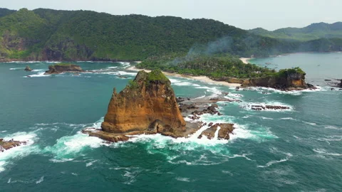 Pantai Papuma Jember Dramatic Cliffs And Rough Ocean South Java Indonesia Drone Stock-Footage 345035852