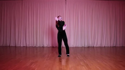 A pantomime actress juggles circus balls on stage. Stock Footage 311944852
