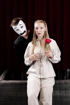 A pantomime episode between two actors expressing the emotion of fear. Stock Photos