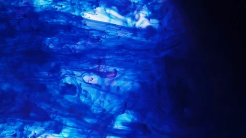 Pantone blue ink paint drops in water slow motion abstract background Stock Footage 124809339