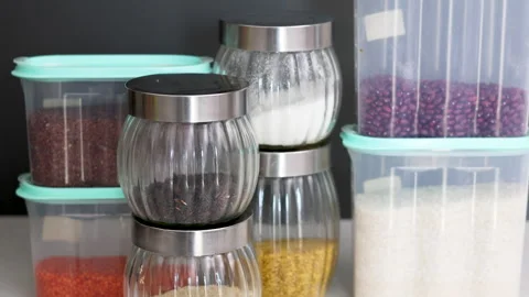 Pantry, storage organization many jars with grains food for sugar salt Stock Footage 247173761