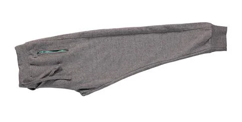 Pants folded in half. Warm gray pants with blue zippers. Stock Photos