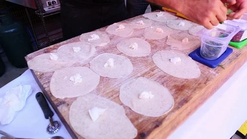 Panzerotti Fill Preparation, Adding Mint Video stock 79055462