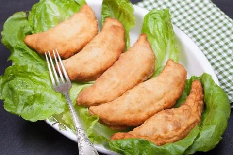 Panzerotti On Lettuce Bed Фото