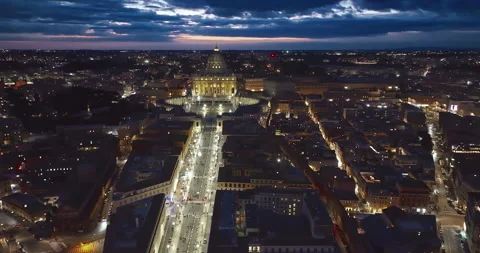 Papal Basilica of St. Peter in the Vatican in evening night illuminations. Papal Stock Footage 308376752