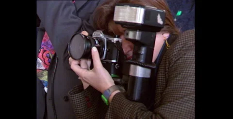 Paparazzi Photographers Taking Photos on Location (1994) Stock Footage 310928361