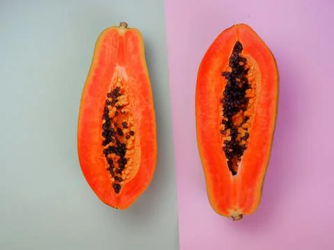 Papaya on a colored background. Vegetable background 写真素材