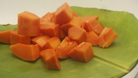 Papaya on white background rotating with blender and papaya smoothie Stock Footage 118773258