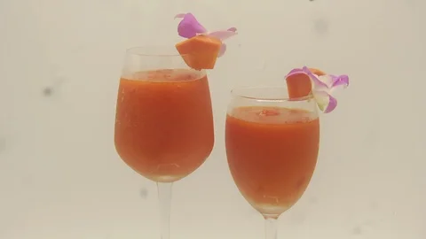 Papaya on white background rotating with blender and papaya smoothie Stock Footage 118773520