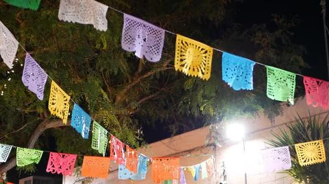 Papel picado garland, paper tissue perforated flags. Mexican party or fiesta. Stock Photos