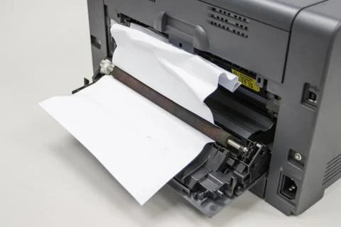 Paper A4 Stuck In Printer At Office, concept repair printer Photos