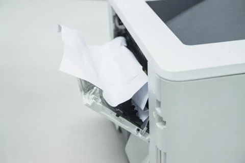 Paper A4 Stuck In Printer At Office, concept repair printer Stock Photos