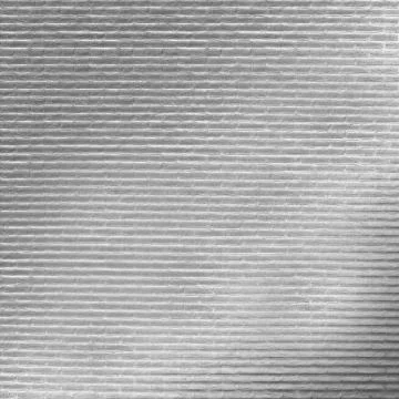 Paper with applied textured pattern in the form of small silver bricks 写真素材