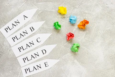 Paper arrows with plan words Foto stock