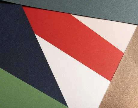 Paper background with matte texture. Layered geometric triangles in crimson.. Foto stock